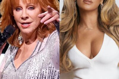 WELP—Reba just clapped back at Beyoncé and it’s got country AND pop fans throwin’ boots and wigs 😬🔥 Reba said calling the whole genre racist is “not just wrong—it’s disrespectful.” Whew, Granny didn’t raise no punk. 💅 Now the internet’s in a full-on music civil war and I’m just here with my popcorn watchin’ the fanbases go feral 🍿💥.